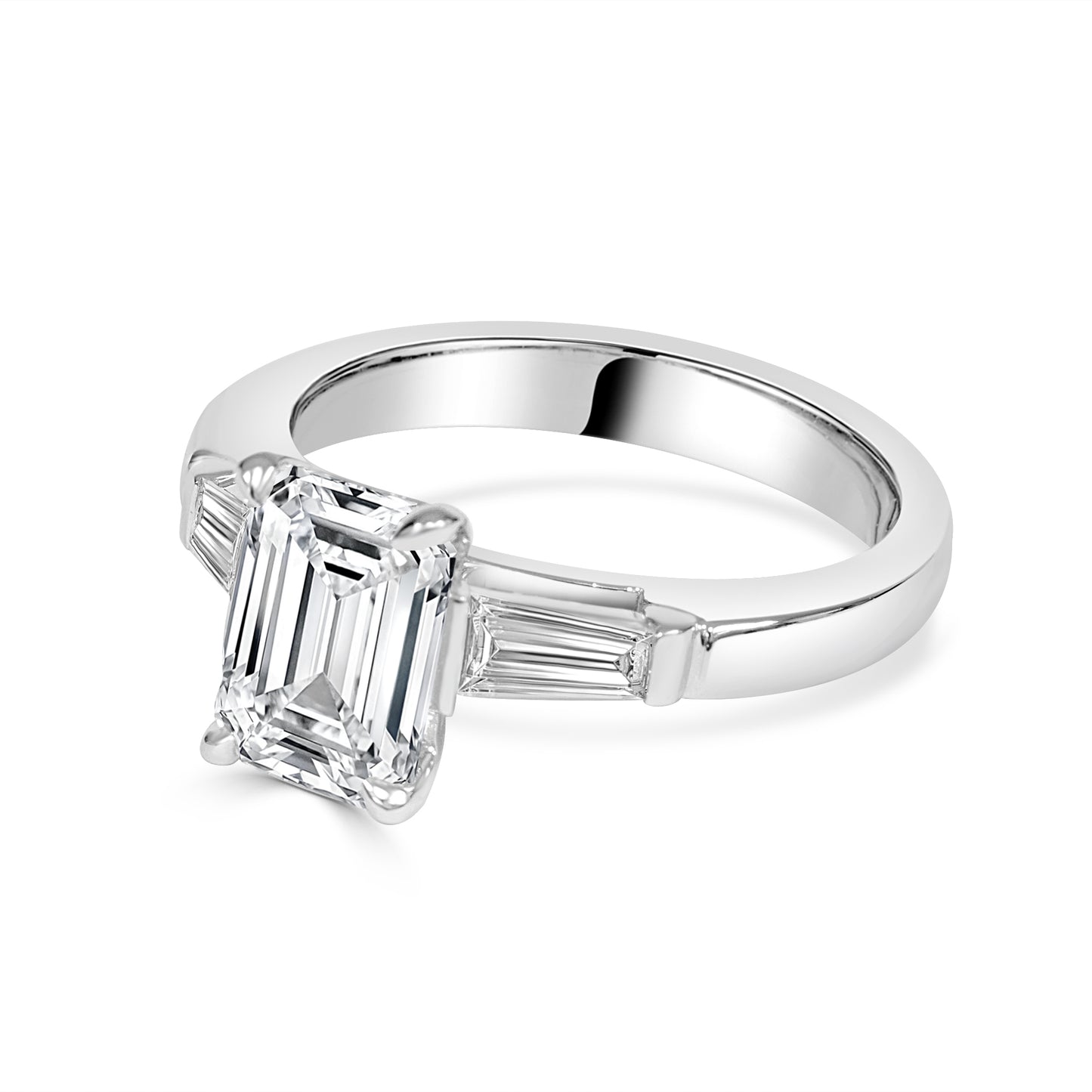 Elara - Emeral cut trilogy enagement ring