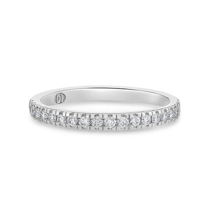 White gold wedding ring with small diamonds on a white background
