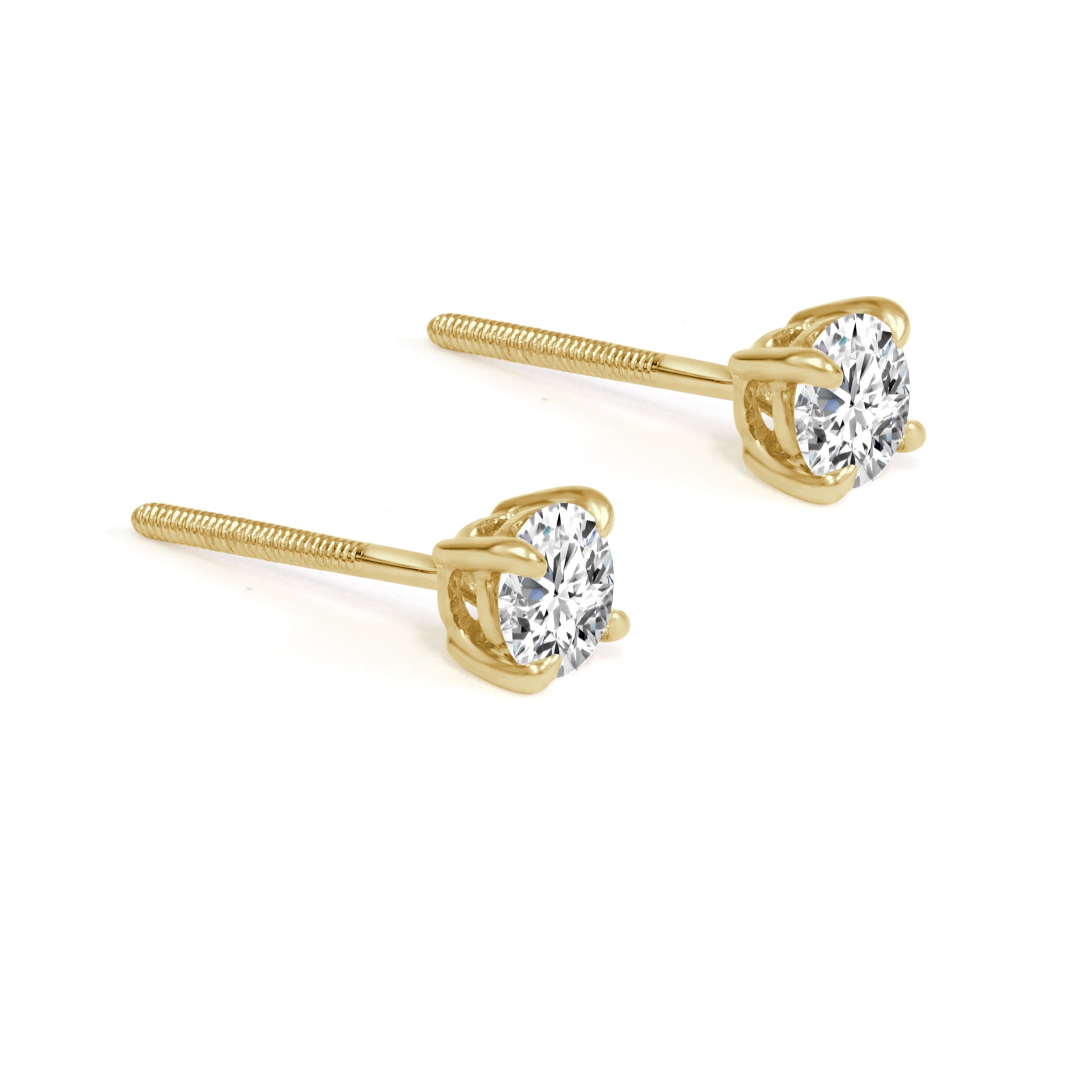 Gold stud earrings with diamonds on a white background