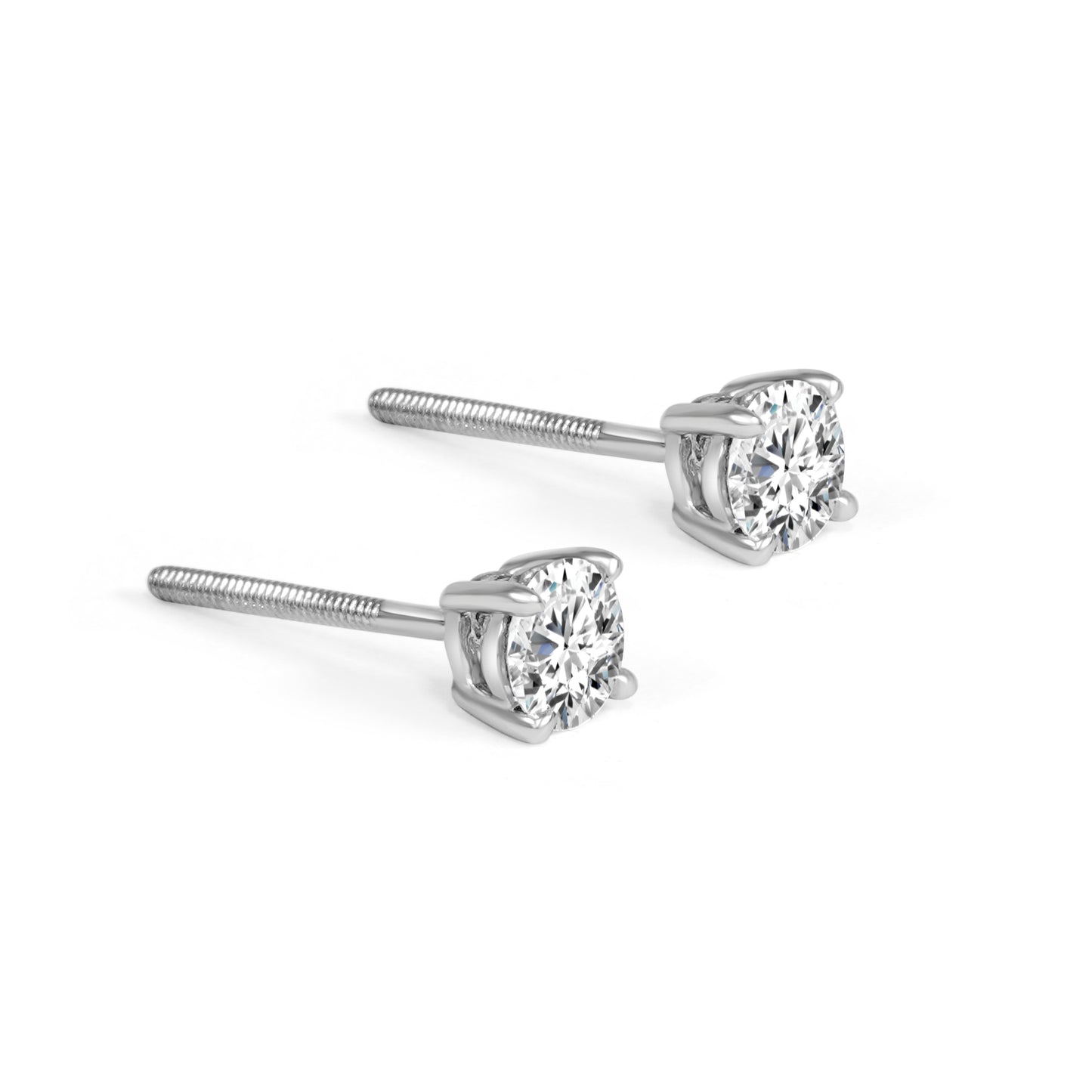Pair of diamond stud earrings on a white background