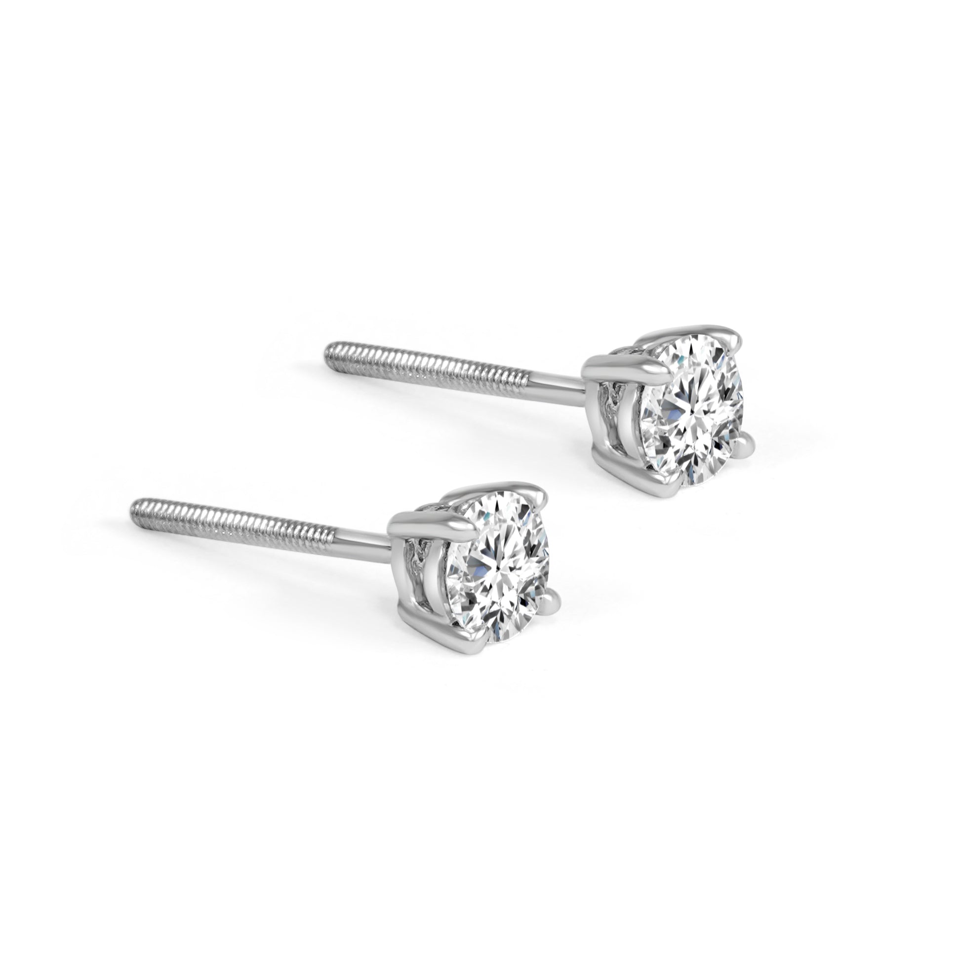 Pair of diamond stud earrings on a white background